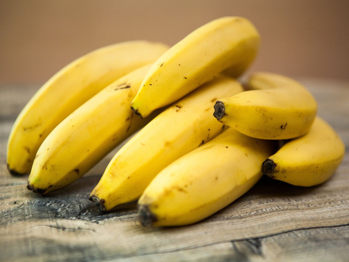 Fresh ripe bananas on a table.