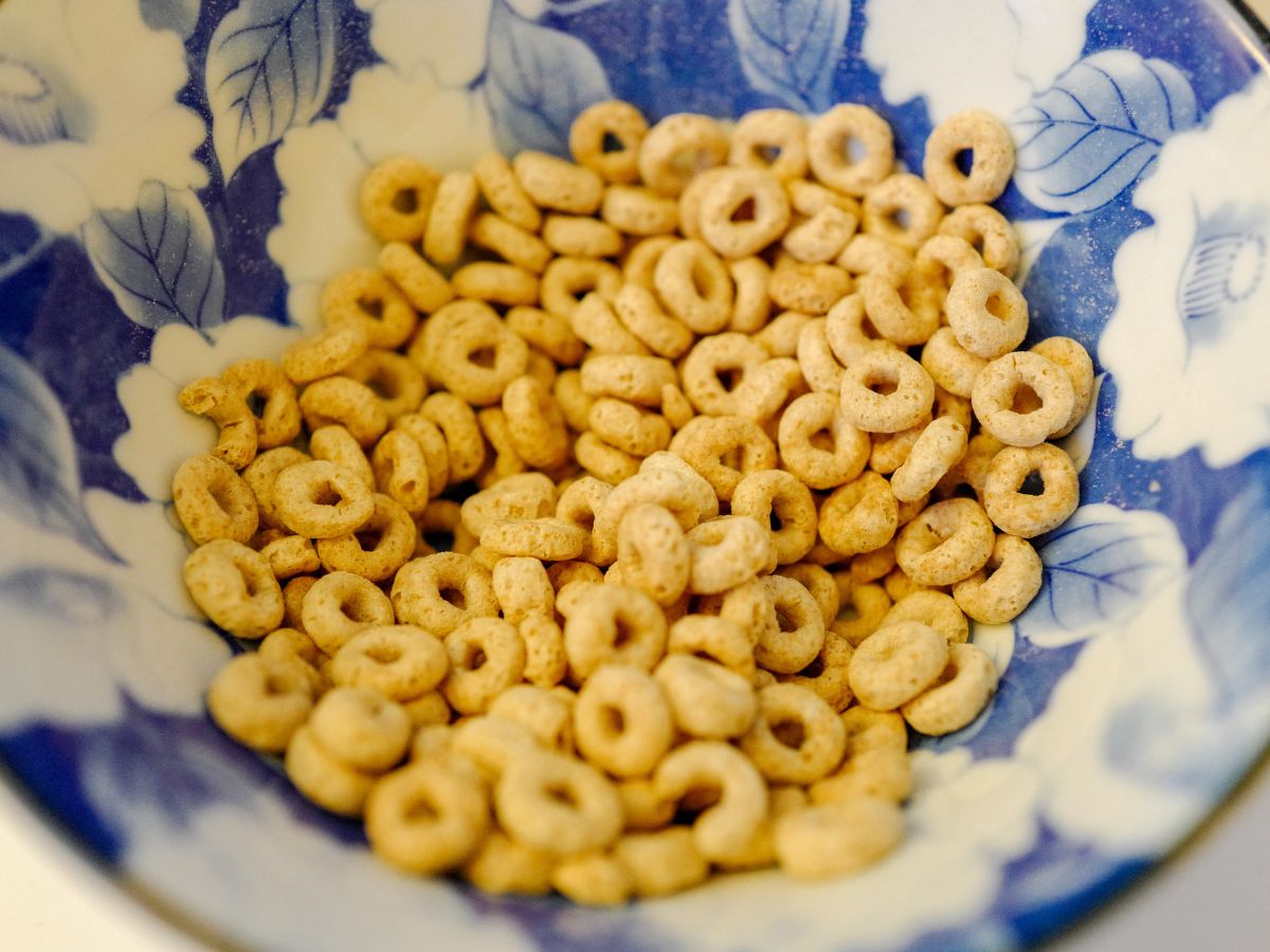 Colorful bowl with cheerios close-up.
