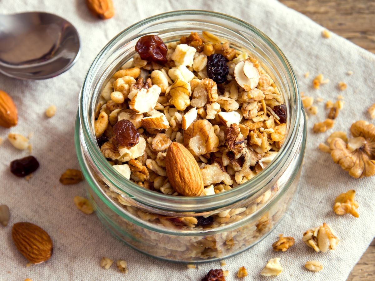 A glass jar full of homemade granola.