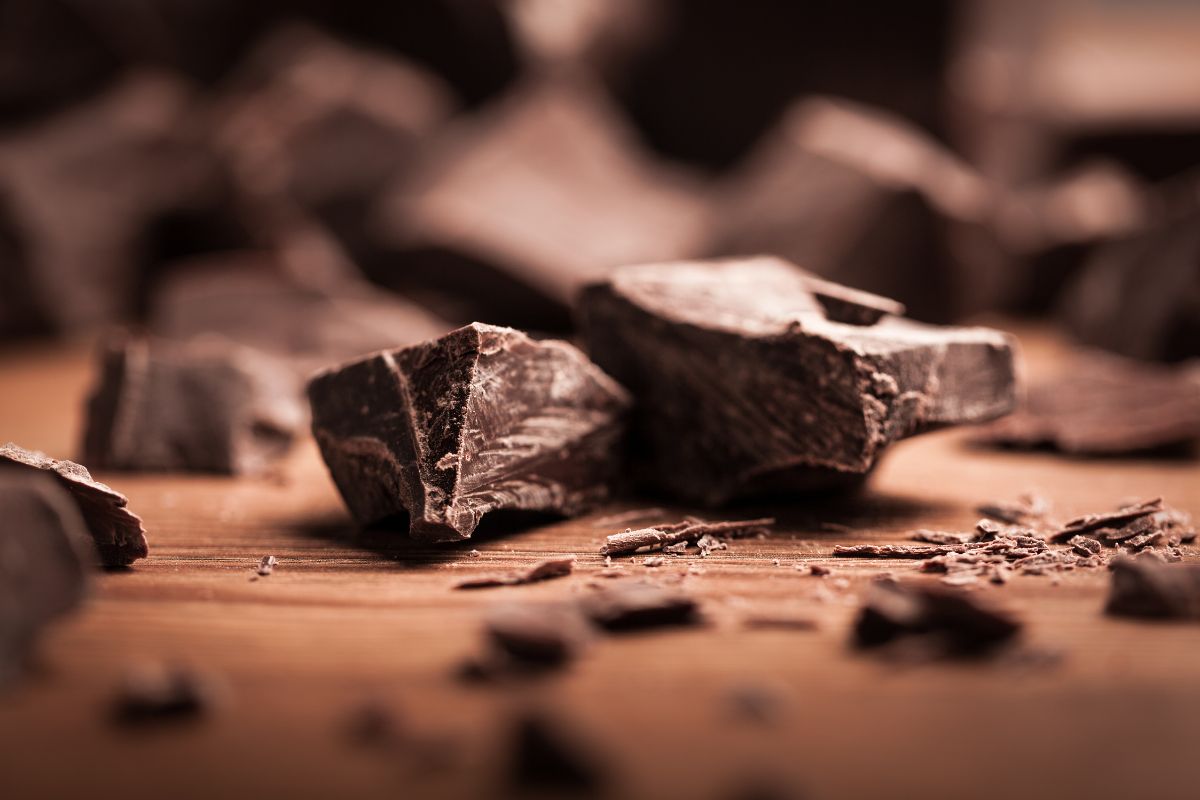 A close-up of pieces of chocolate on a table.