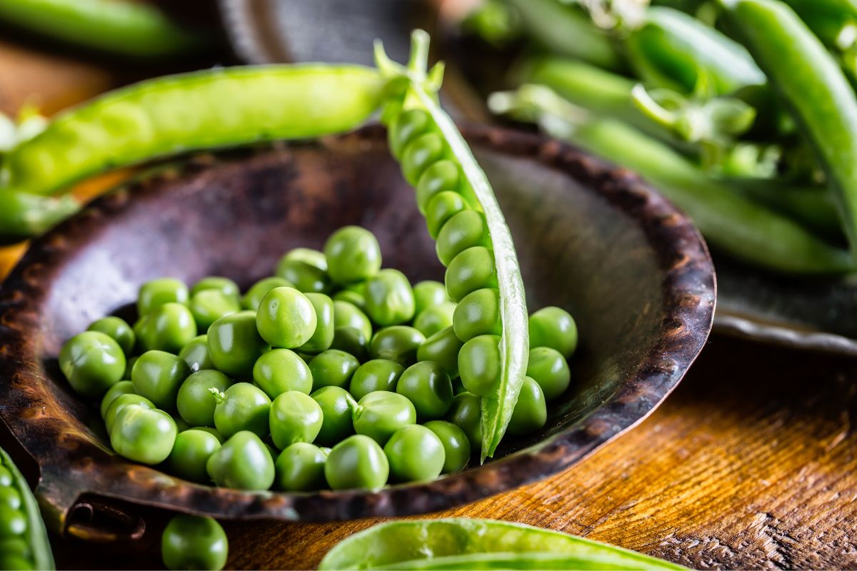 A bowl full of organic peas.