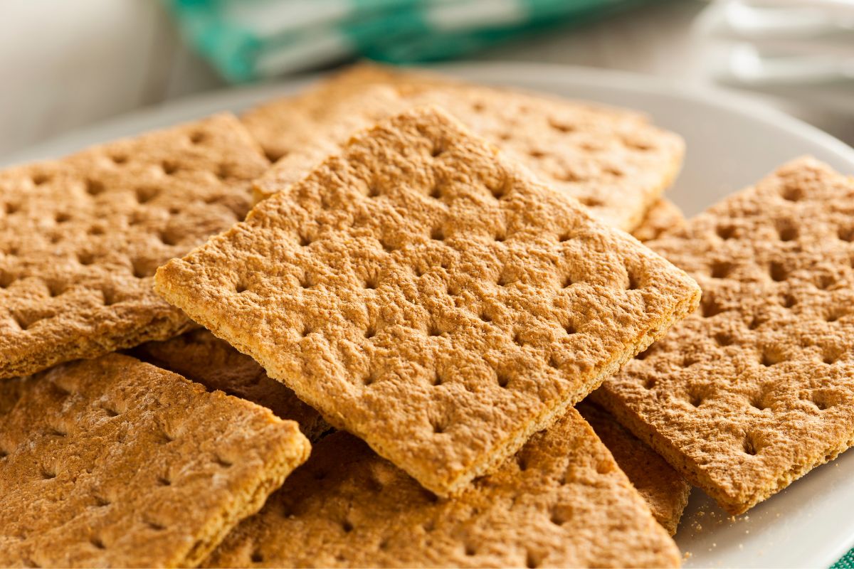 A bunch of graham crackers on a plate.
