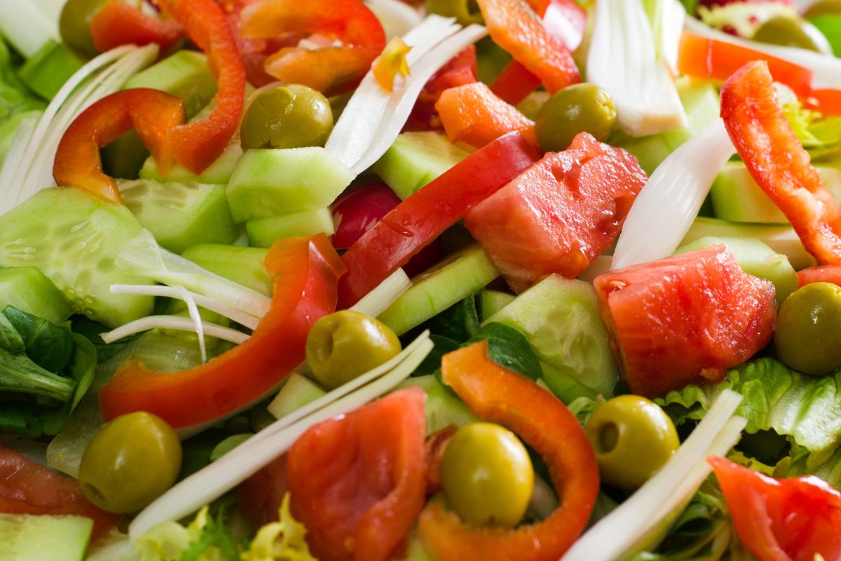 Different varieties of sliced vegetables.